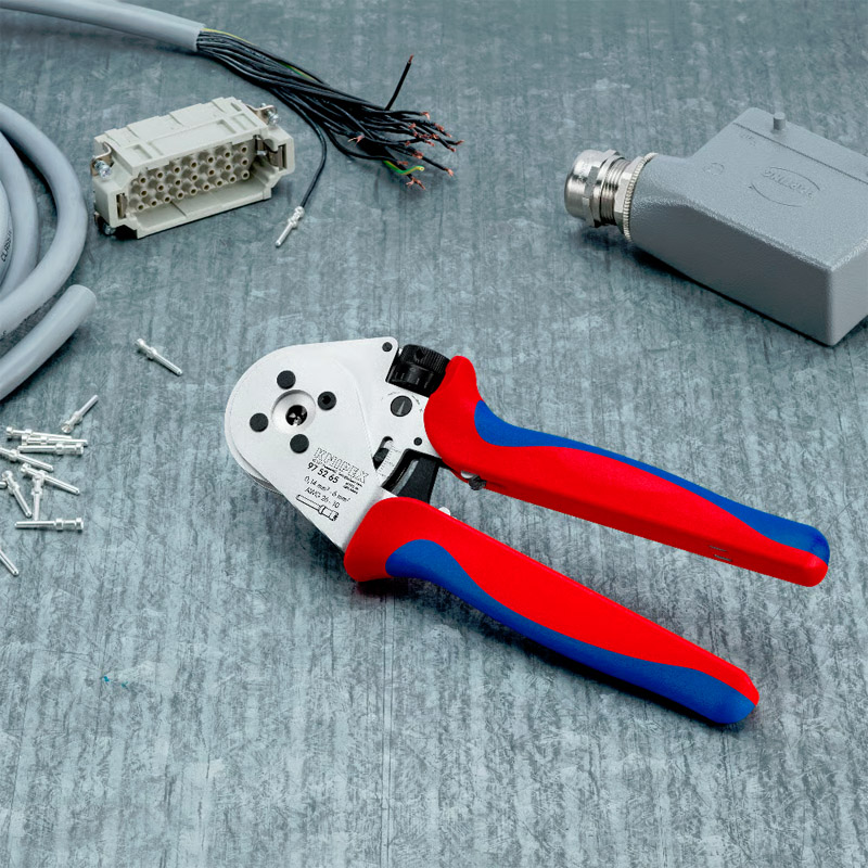 Cleste de presare KNIPEX 230 mm, cu patru dornuri pentru contacte rasucite, cu suport de contact si reglaj mecanic al avansului